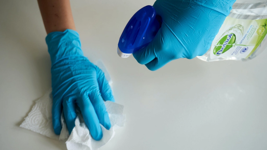 person-wearing-blue-gloves-cleaning-4021256, 