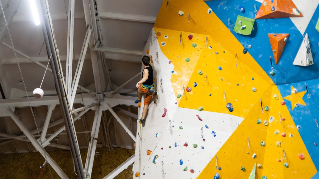 A rock climbing wall for background,  