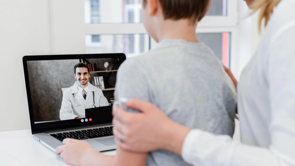 close-up-patient-talking-to-doctor-online (1), 