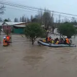 Rescate de familias por inundaciones, Carabineros