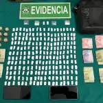 Droga y dinero en efectivo incautado por Carabineros., Cedida