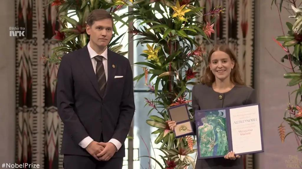 Ana Corina Sosa Machado, hija de la líder opositora, fue recibida con una ovación de pie por los asistentes., redes sociales